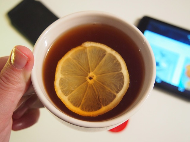 Lemon slice in cup of tea